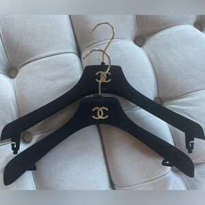 CHANEL Black Hangers with Gold Accents